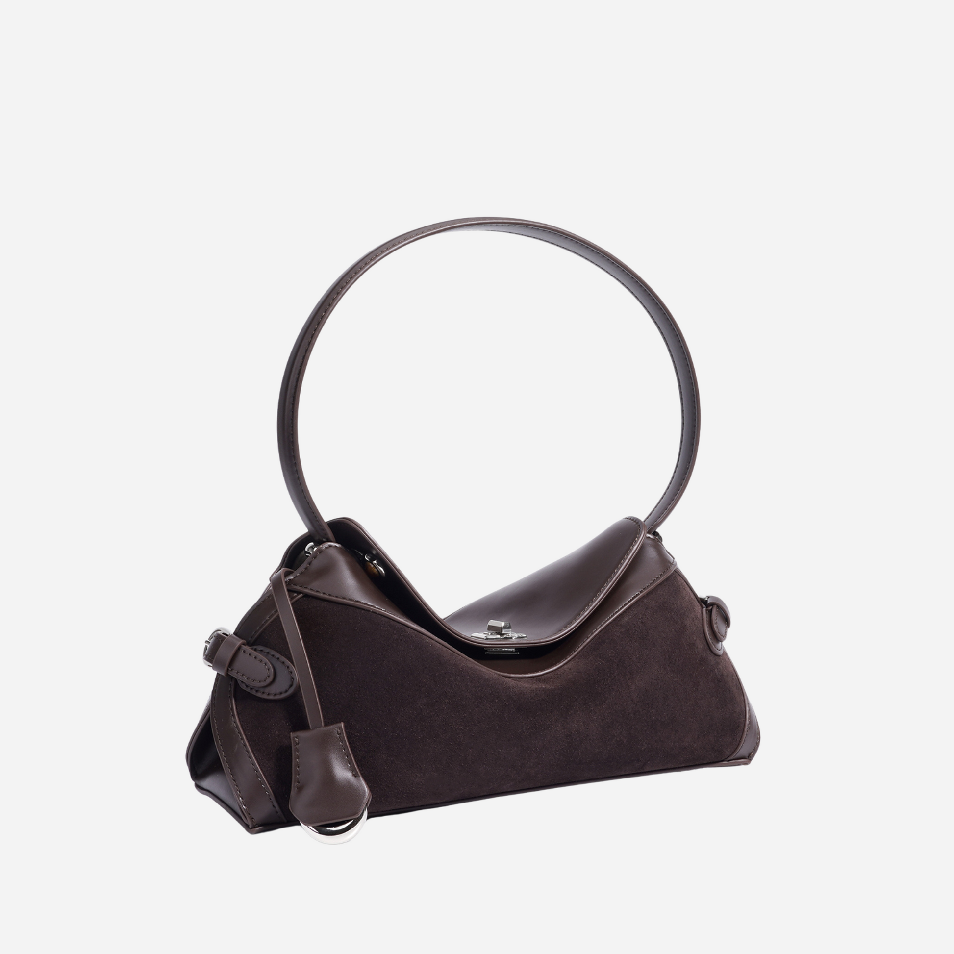 Dark brown suede and leather handbag with circular handle, angled front view.
